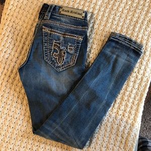 Rock revival distressed skinny jeans